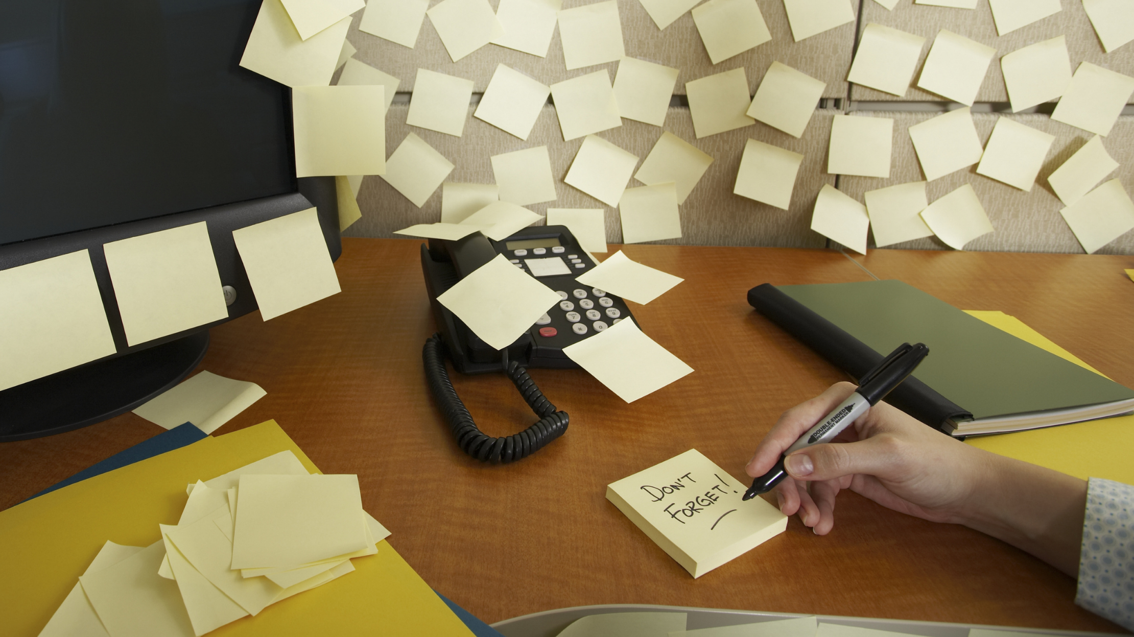 Paperwork and office desk representing manual administration before digital staffing technology